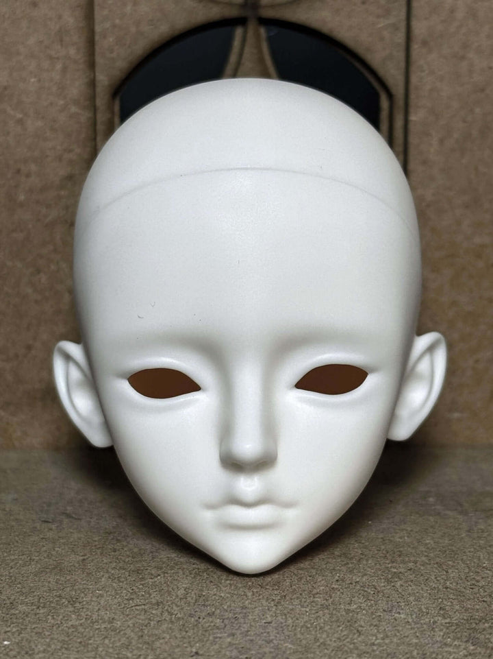 Front view of Alpha BJD doll head, displaying detailed facial sculpt and realistic features