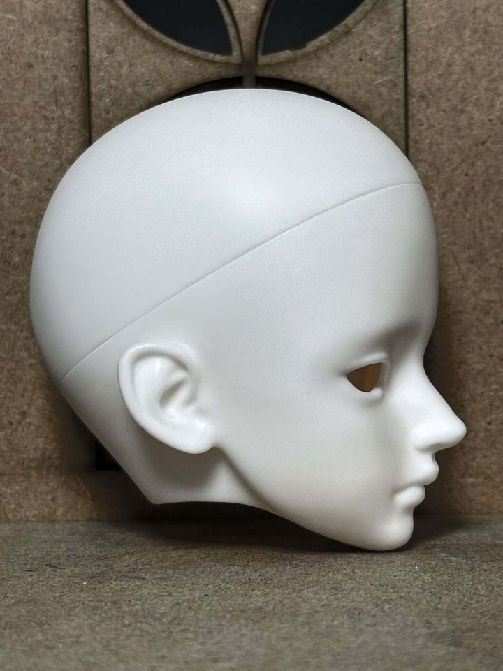 Right side view of Alpha BJD doll head, highlighting the unique resin sculpt and artistry