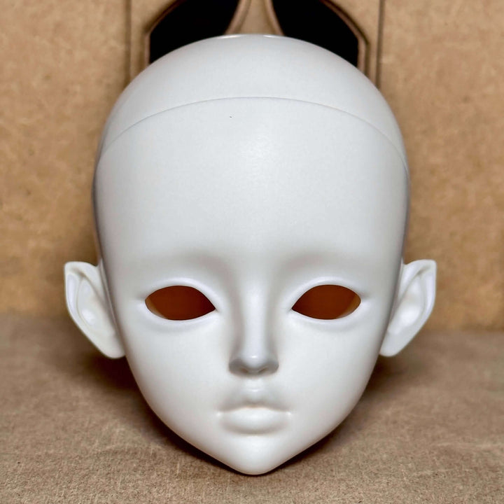 KiKi BJD doll head, without makeup or clothing, raw resin finish showcasing fine sculpt details